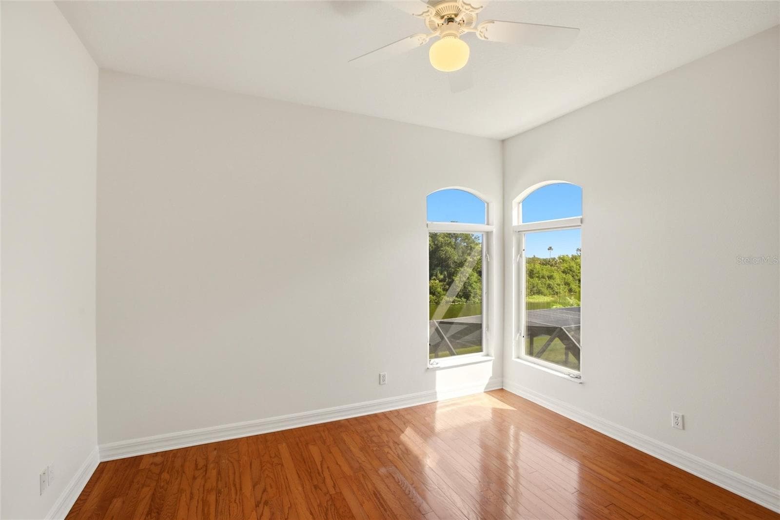 The Jack-and-Jill suites feature hardwood flooring and well-appointed bathrooms with a shower/tub combination, walk-in closets, and a private water closet. - 8417 LONE EAGLE WAY, SARASOTA