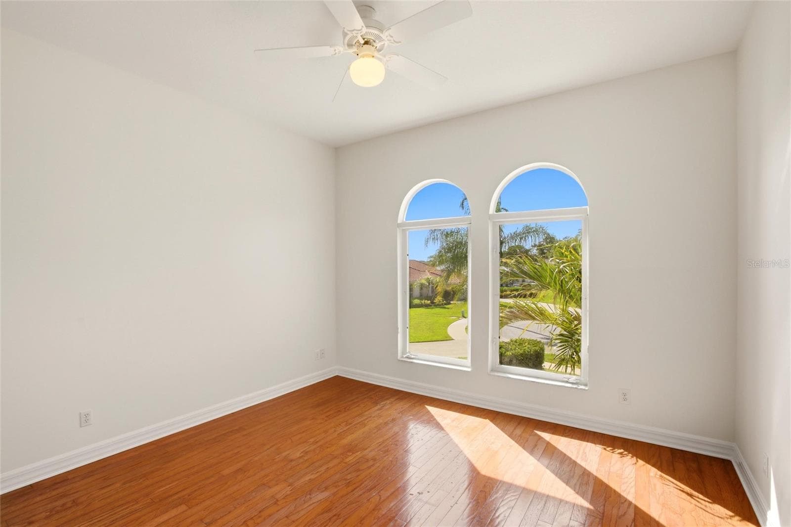 The Jack-and-Jill suites feature hardwood flooring and well-appointed bathrooms with a shower/tub combination, walk-in closets, and a private water closet. - 8417 LONE EAGLE WAY, SARASOTA