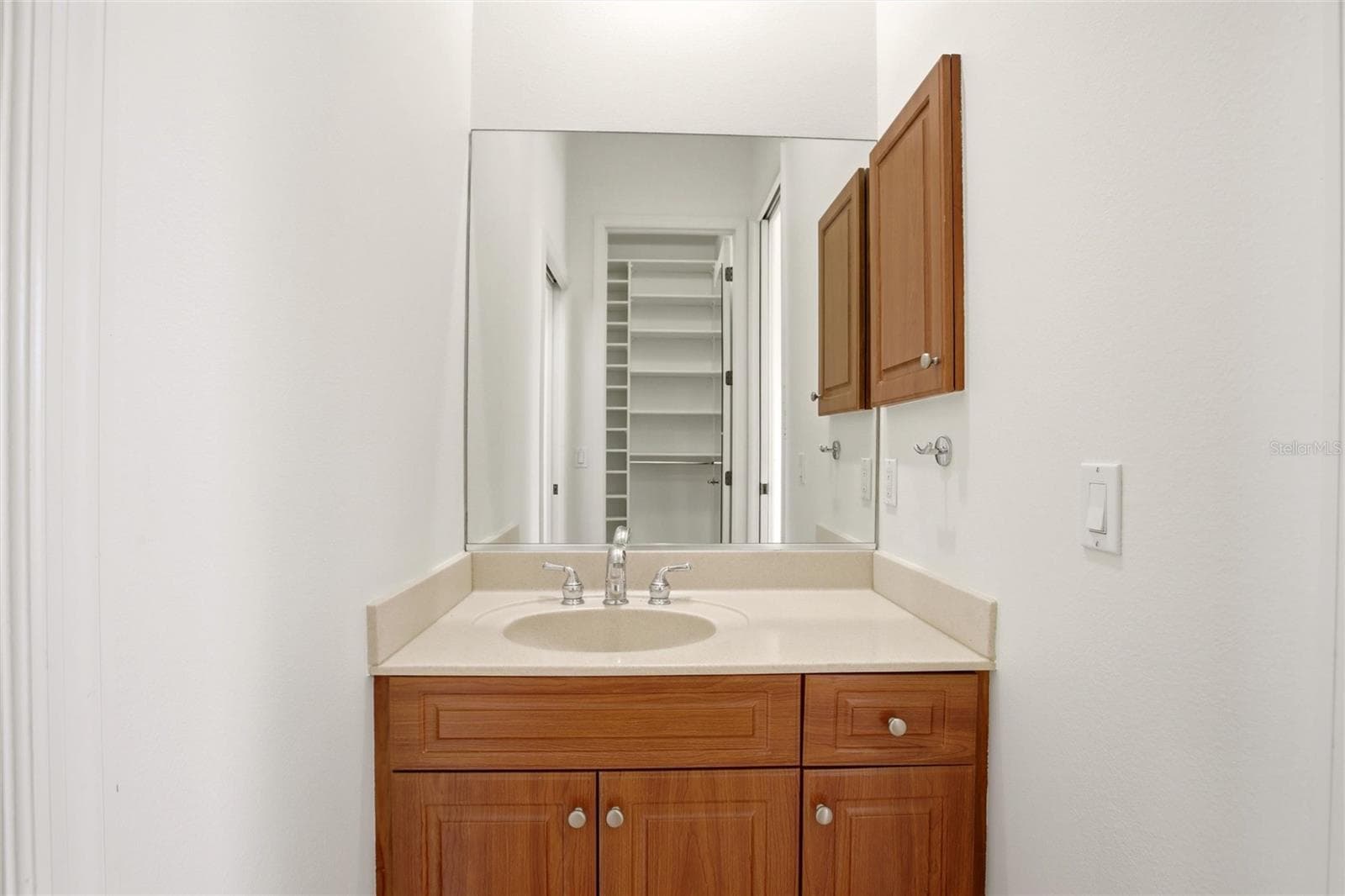 The Jack-and-Jill suites feature hardwood flooring and well-appointed bathrooms with a shower/tub combination, walk-in closets, and a private water closet. - 8417 LONE EAGLE WAY, SARASOTA