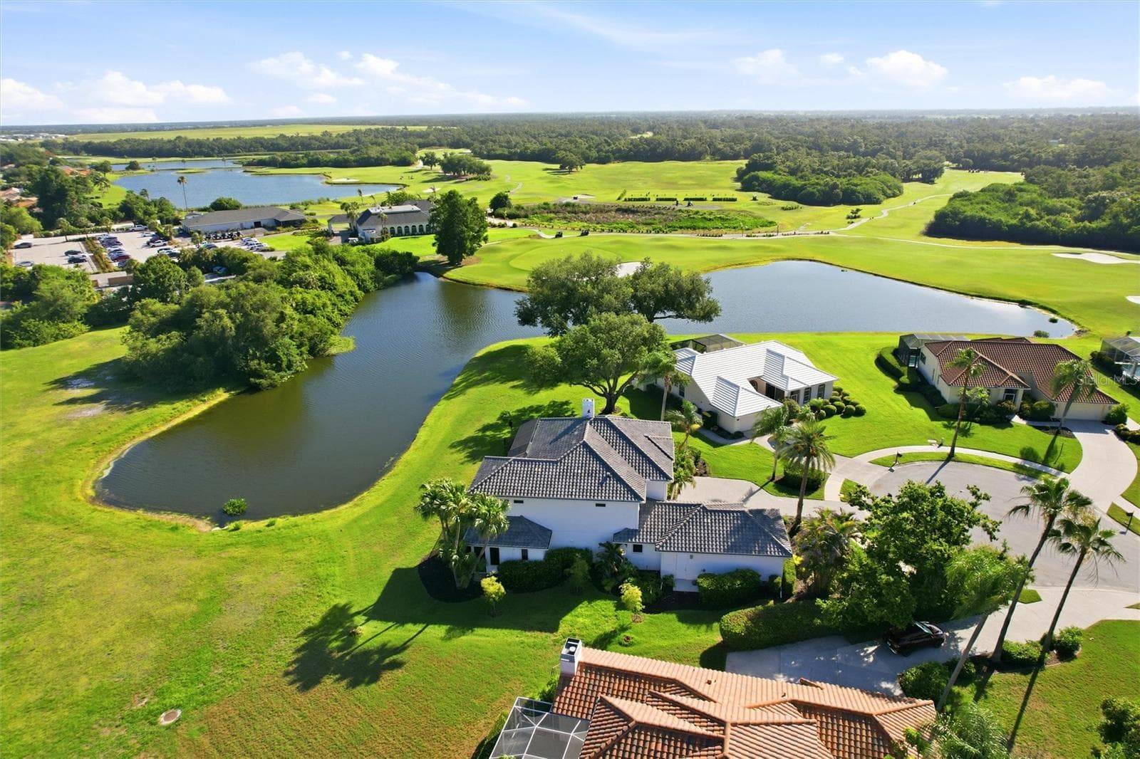 Enjoy sweeping views of the 18th Hole of Misty Creek from your lanai. - 8417 LONE EAGLE WAY, SARASOTA