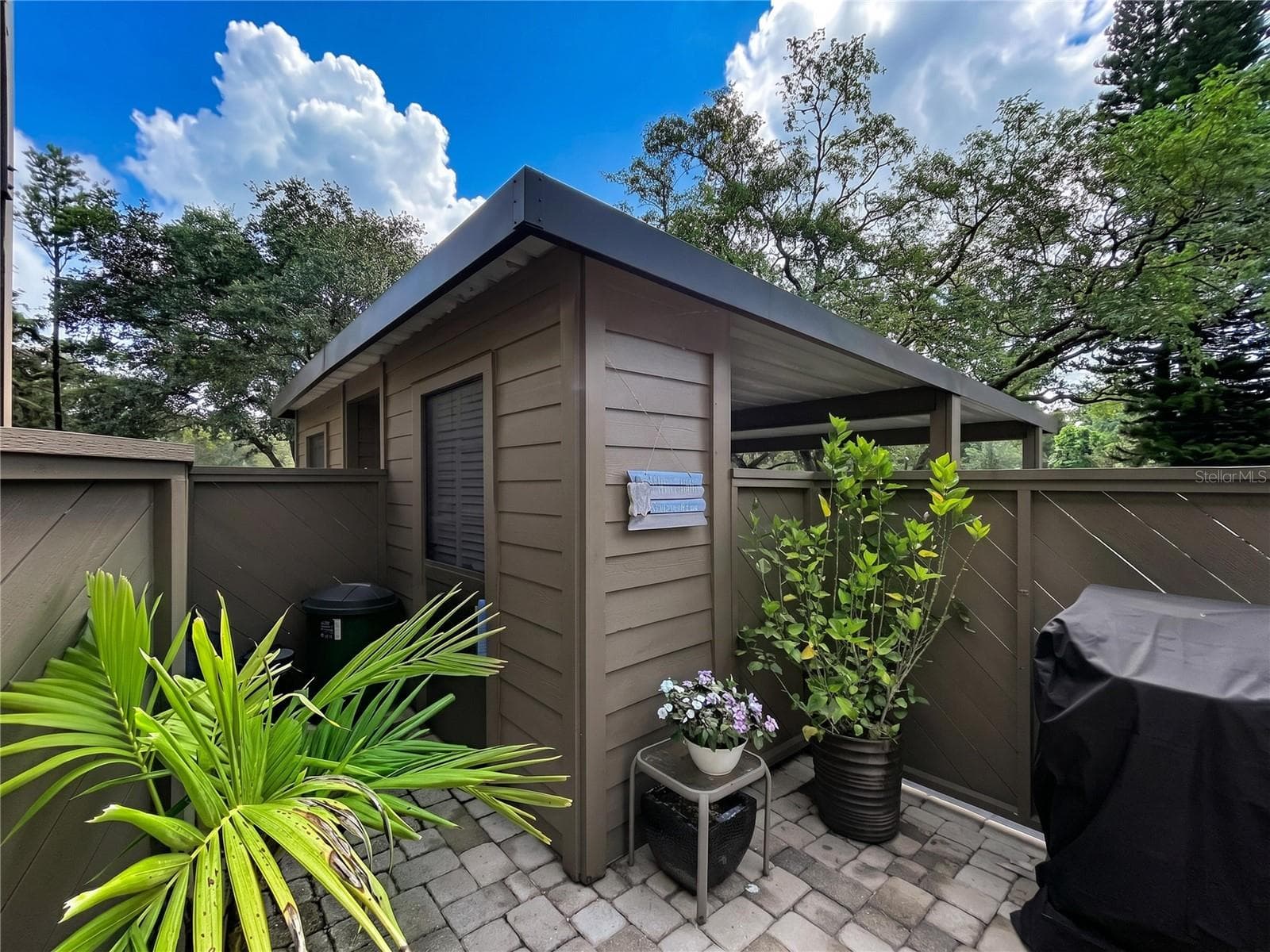Patio to grill along with storage closet - 1006 LENNOX RD W #1006, PALM HARBOR