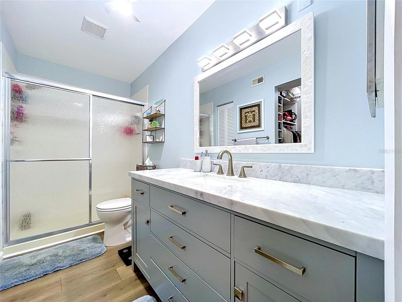 Shower with new glass doors in Primary bath - 1006 LENNOX RD W #1006, PALM HARBOR