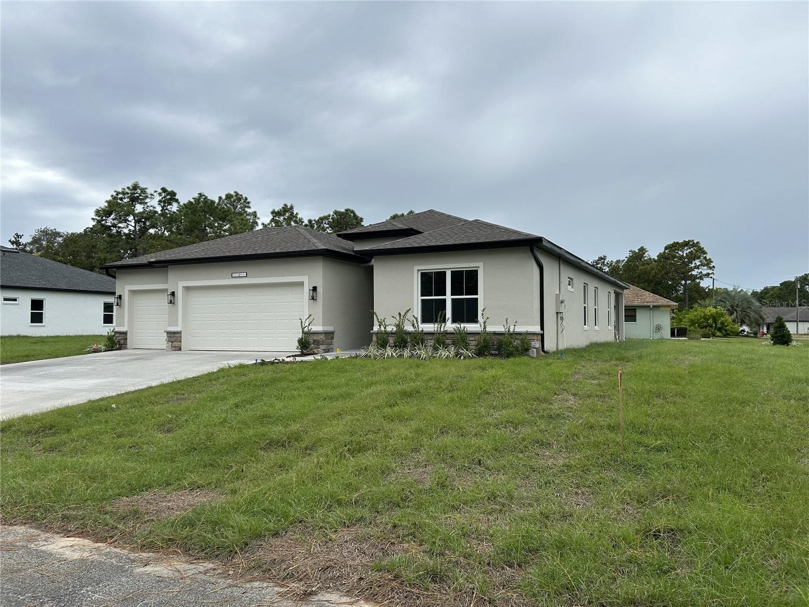 Not the actual home. Photos are of a similar floorplan. Interior/Exterior colors and features may vary. - 5887 N BEDSTROW BLVD, DUNNELLON