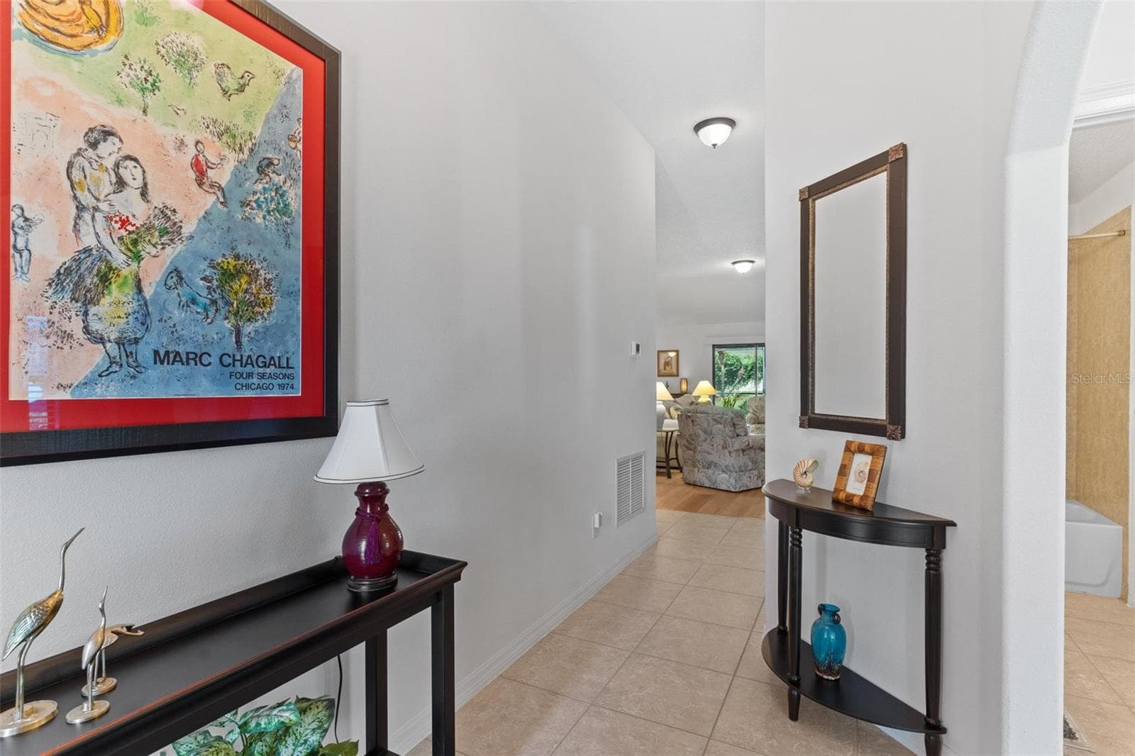 Foyer lead to Great Room & Bedrooms 2 & 3... - 6115 LANDINGS BLVD, LADY LAKE