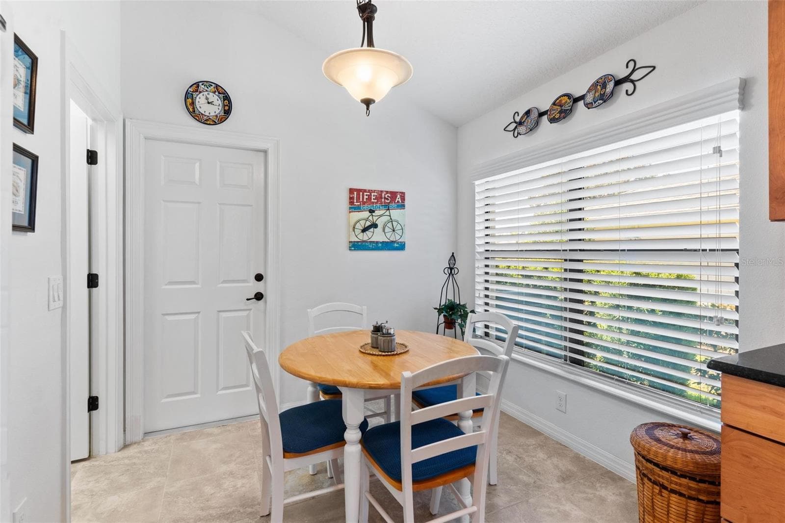 Dinette area lead to Garage. - 6115 LANDINGS BLVD, LADY LAKE