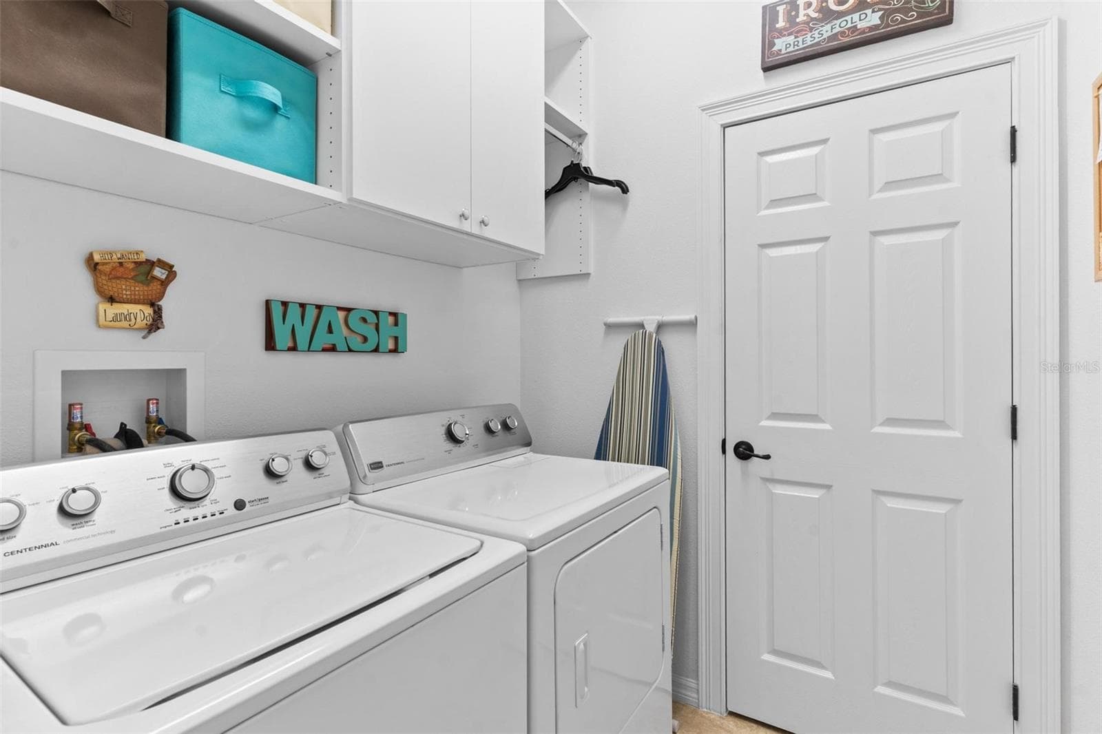 Inside Laundry Room convey the Washer & Dryer - 6115 LANDINGS BLVD, LADY LAKE