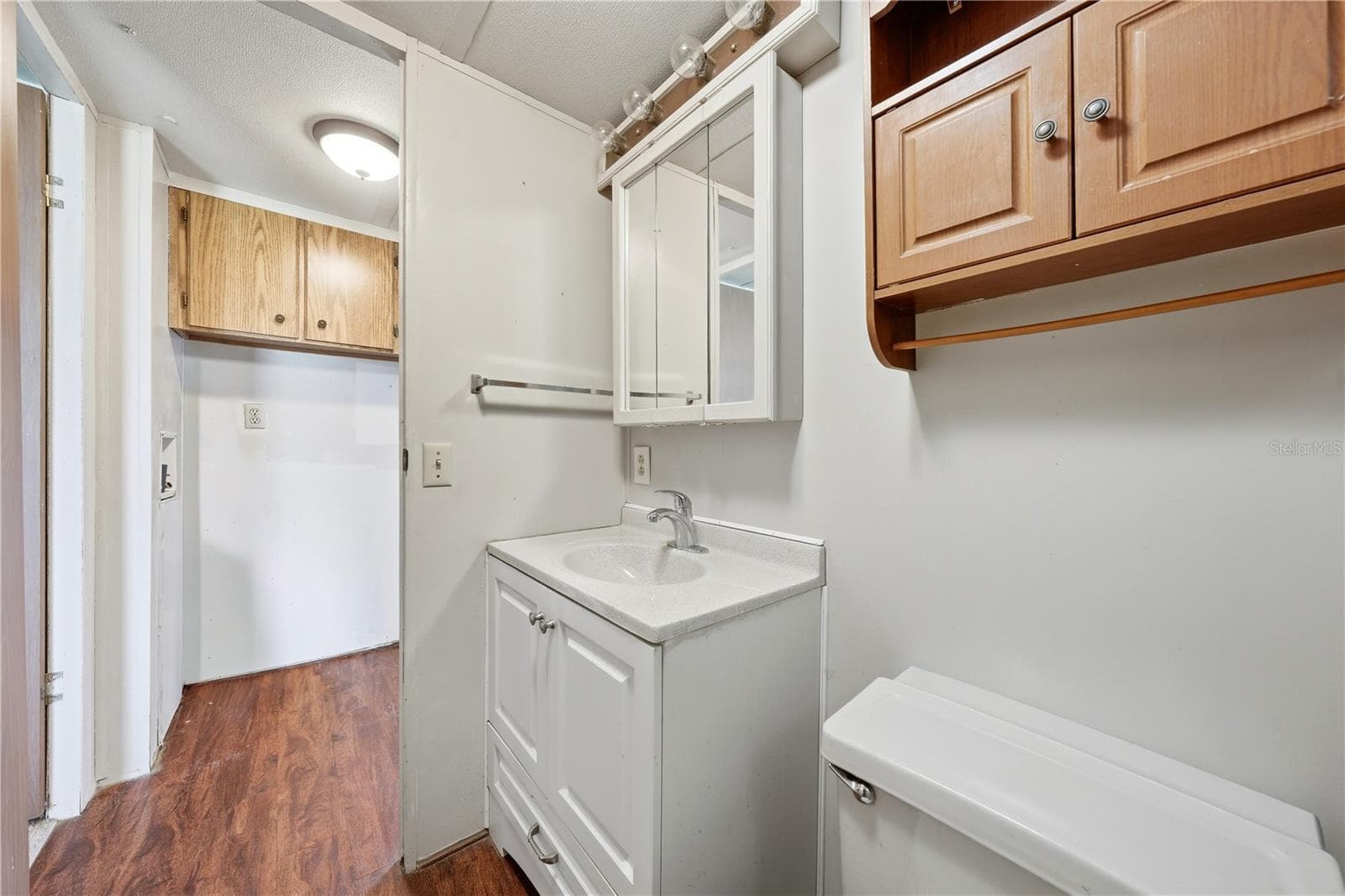 Laundry connections in hallway across from bathroom - 30107 GREEN BAY DR, TAVARES