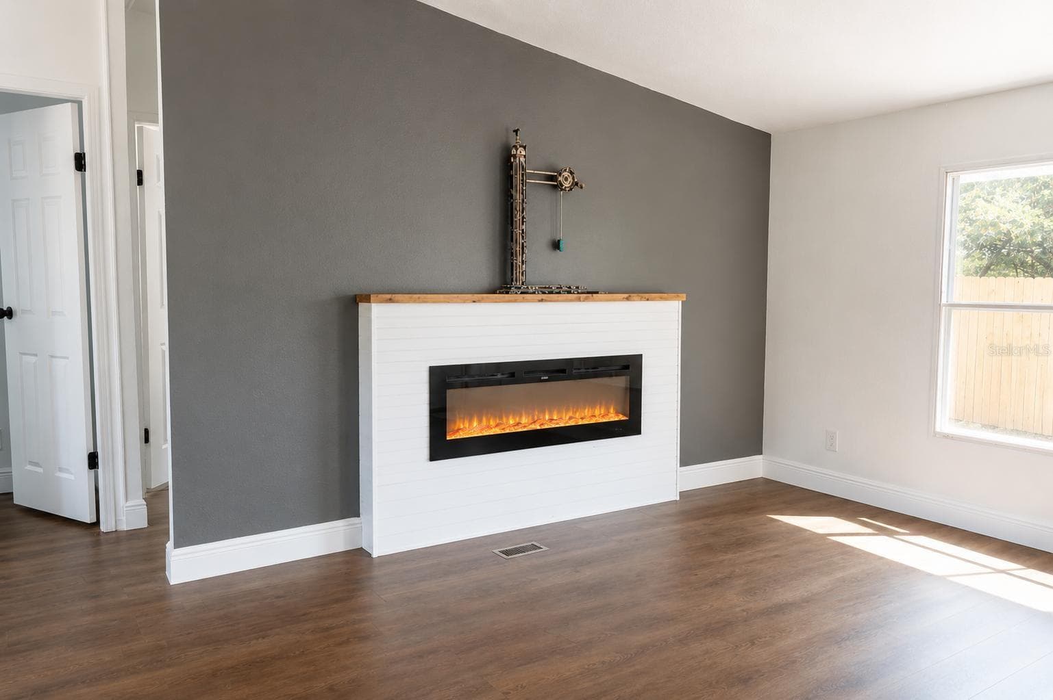 Living Area with New Electric Fireplace - 1809 NE 162ND ST, CITRA