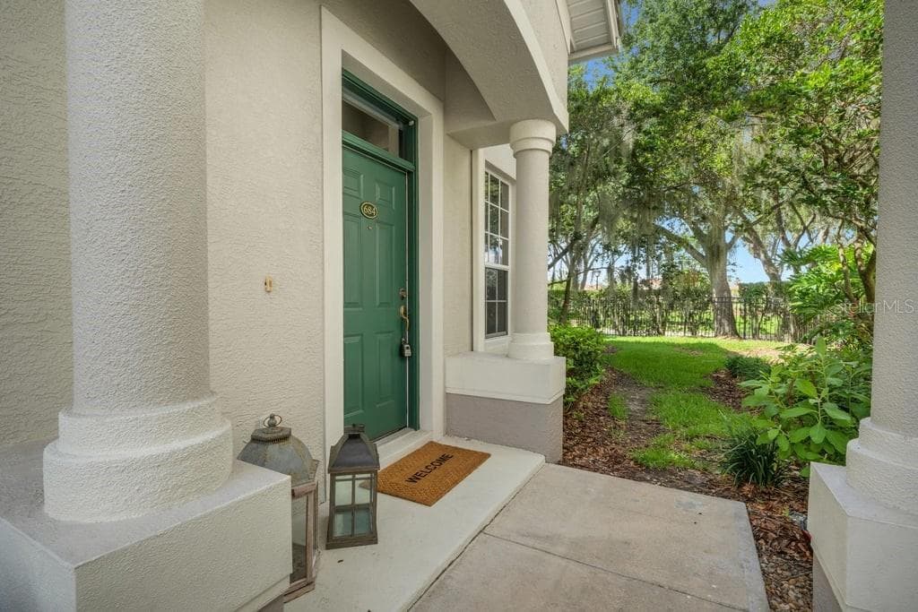Each condo has a private entrance . . . - 684 GRASSLANDS VILLAGE CIR, LAKELAND