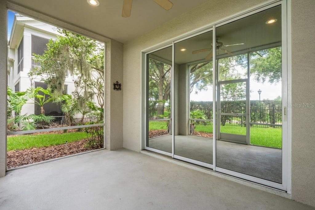 And during the milder months the stacking sliders opens this space up to become an integral part of your living area. - 684 GRASSLANDS VILLAGE CIR, LAKELAND