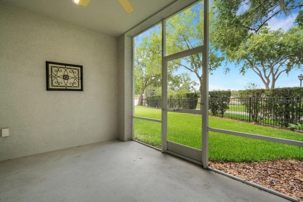 Exterior building maintenance and landscaping is handled by the association. - 684 GRASSLANDS VILLAGE CIR, LAKELAND