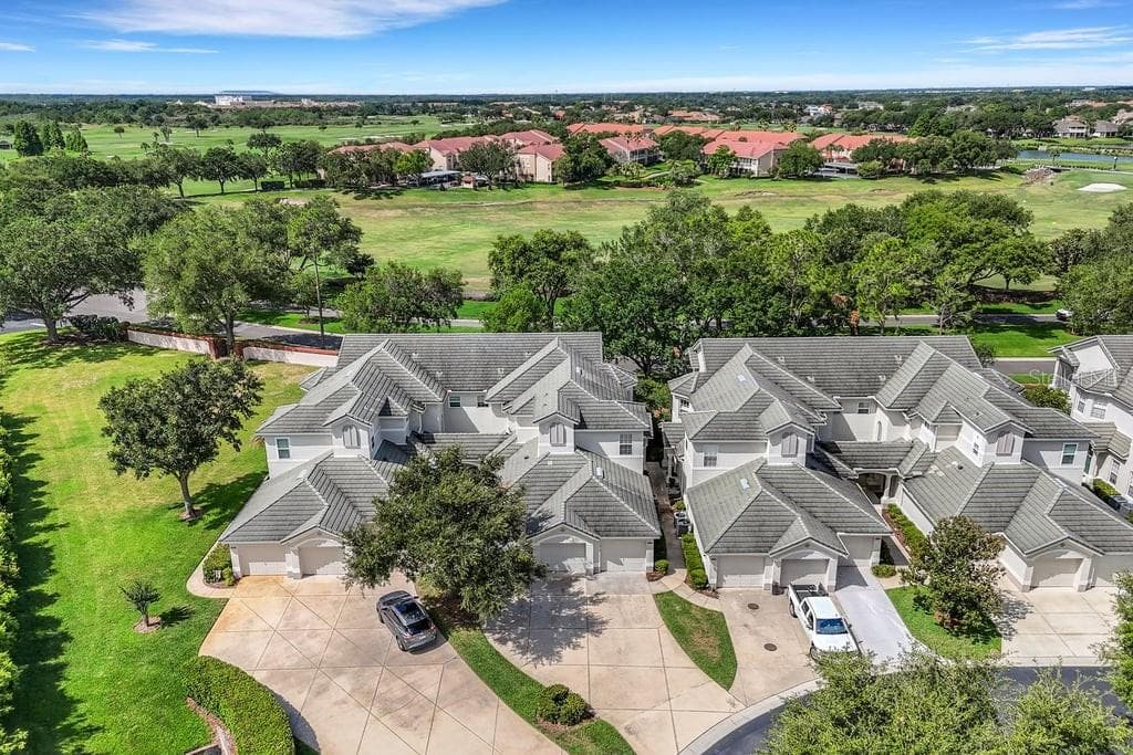 Tile roofs on all buildings in Muirfield are also maintained by the association. - 684 GRASSLANDS VILLAGE CIR, LAKELAND