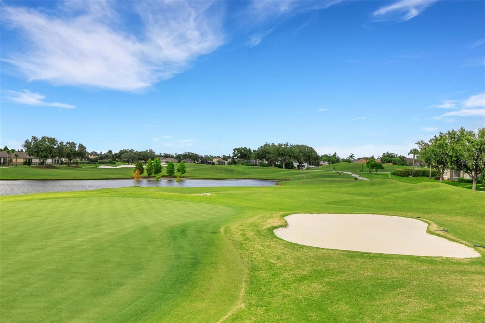 The views never end and all is maintained to resort-like perfection. - 684 GRASSLANDS VILLAGE CIR, LAKELAND