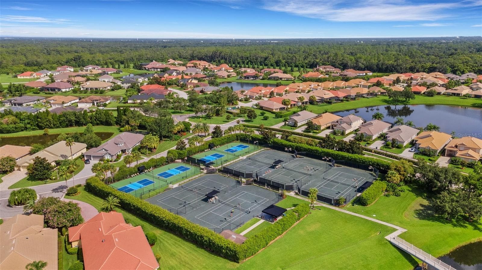 With 5 soft/clay tennis courts . . . - 684 GRASSLANDS VILLAGE CIR, LAKELAND