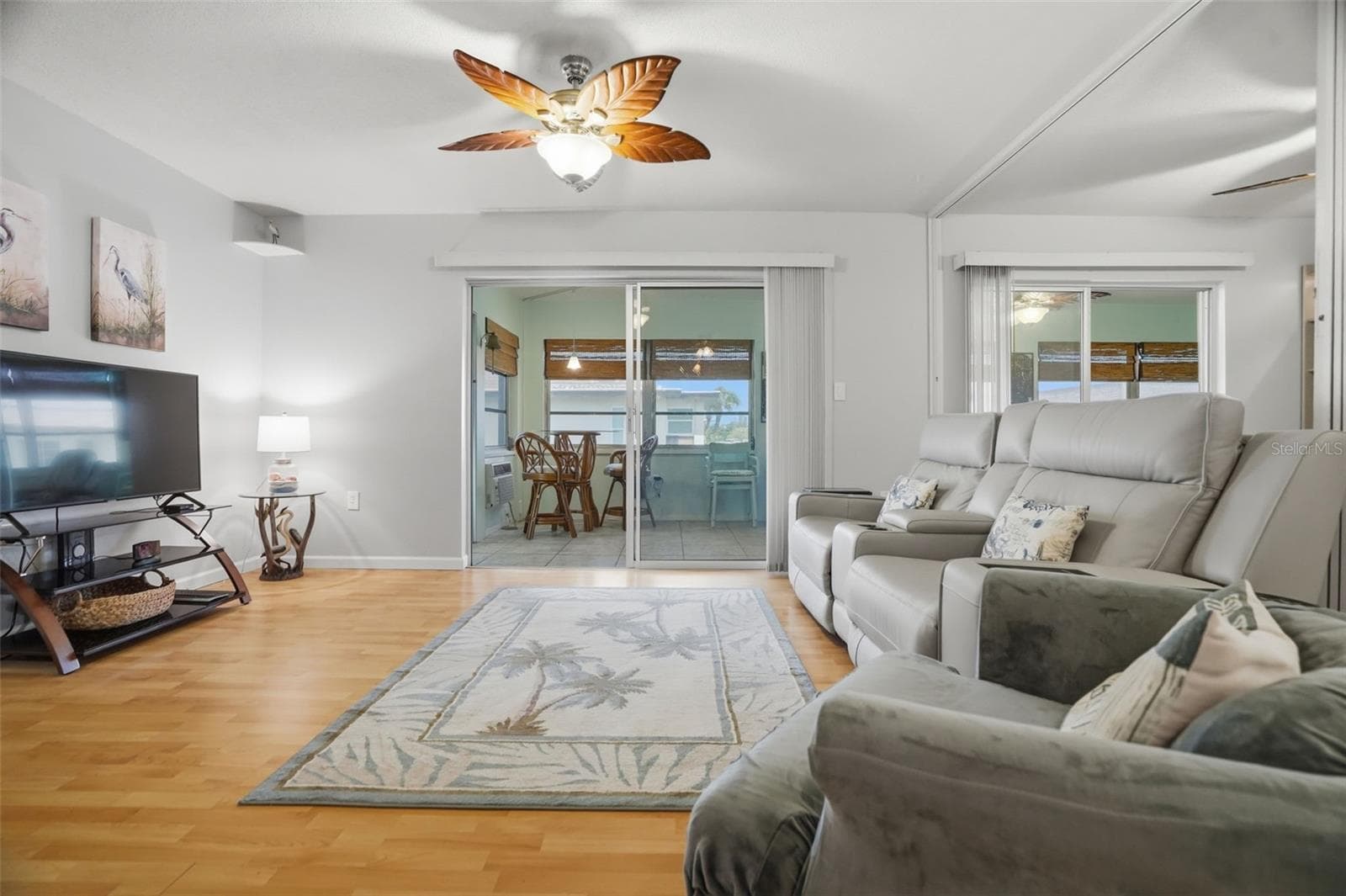 Living room with partition open - 5108 AMULET DR #205, NEW PORT RICHEY