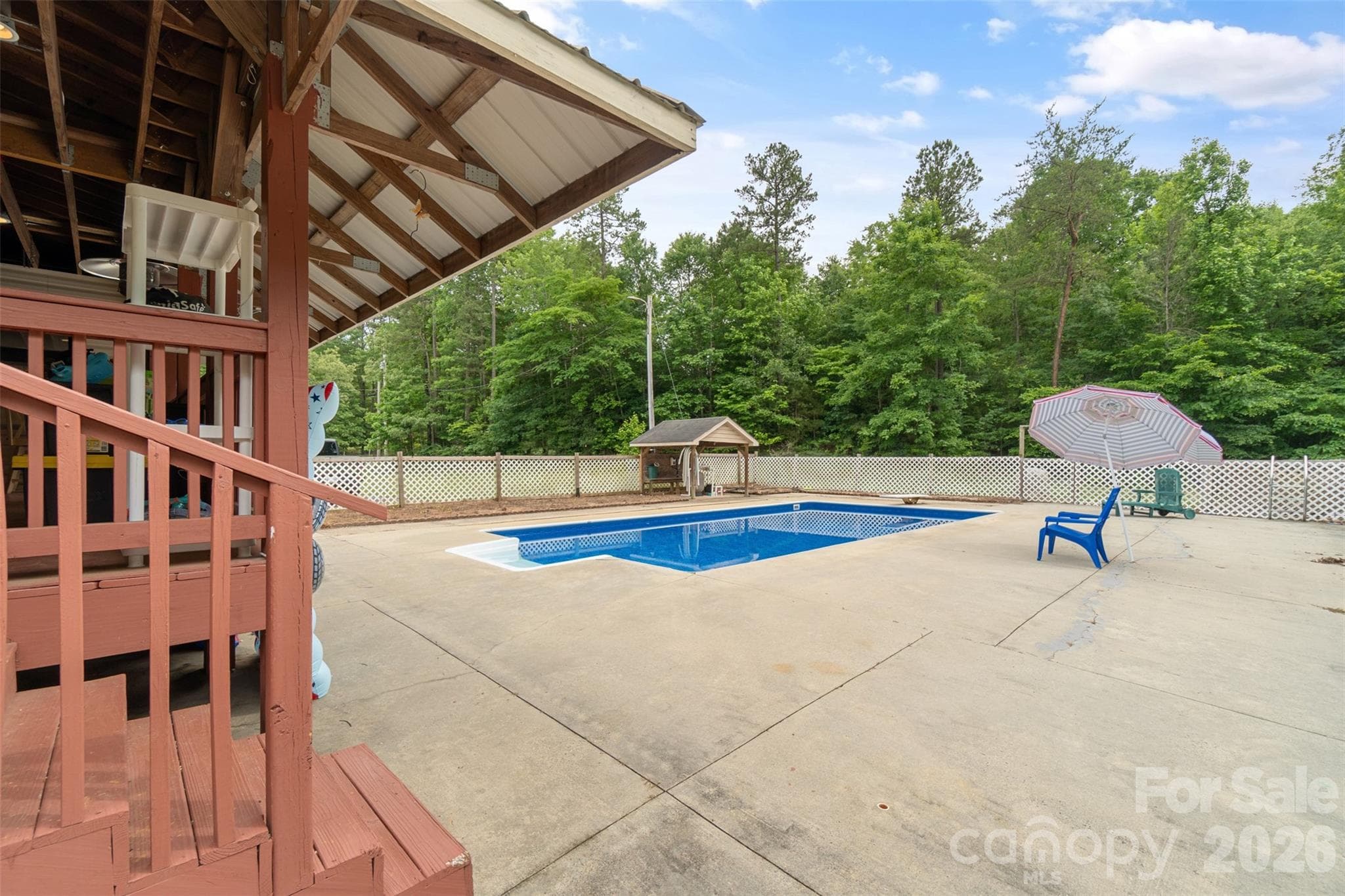 Pool and covered back porch - 229 Oakridge Road, Stanley