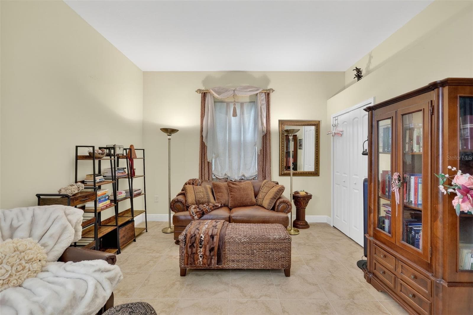 This versatile guest suite offers exceptional flexibility, with ample space for a bedroom, sitting area, media room, or private retreat. - 1210 408TH CT E, MYAKKA CITY