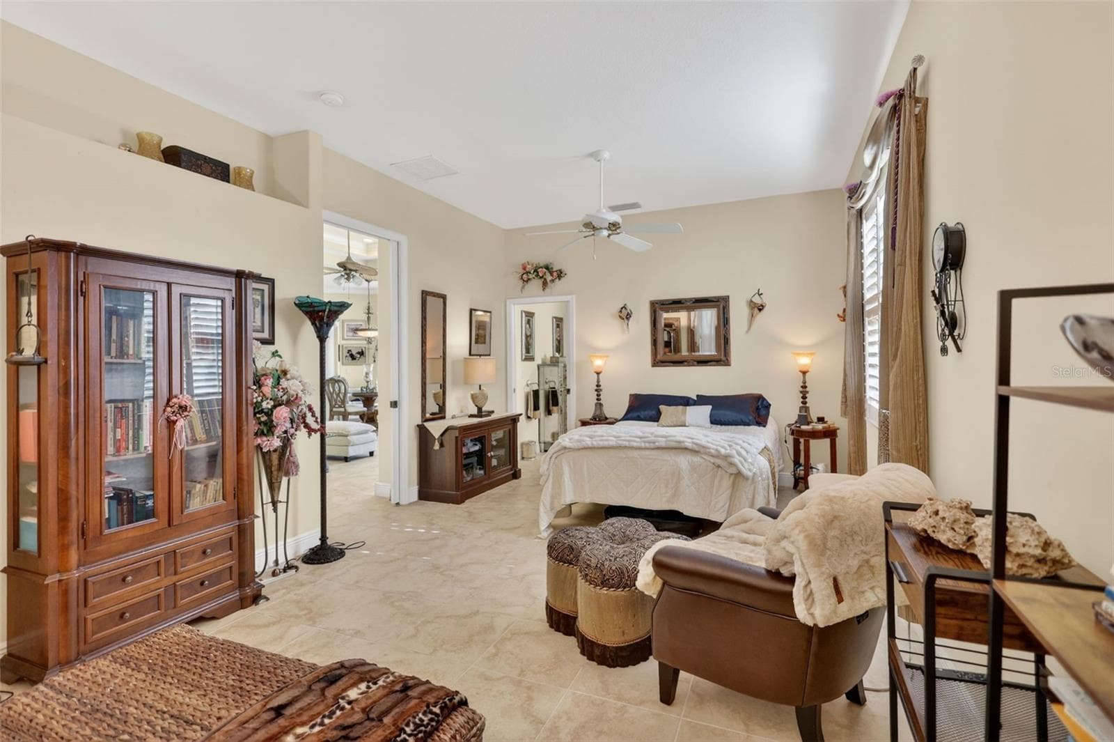 The generously proportioned guest suite provides comfort and versatility, with abundant natural light and room for multiple living arrangements. - 1210 408TH CT E, MYAKKA CITY
