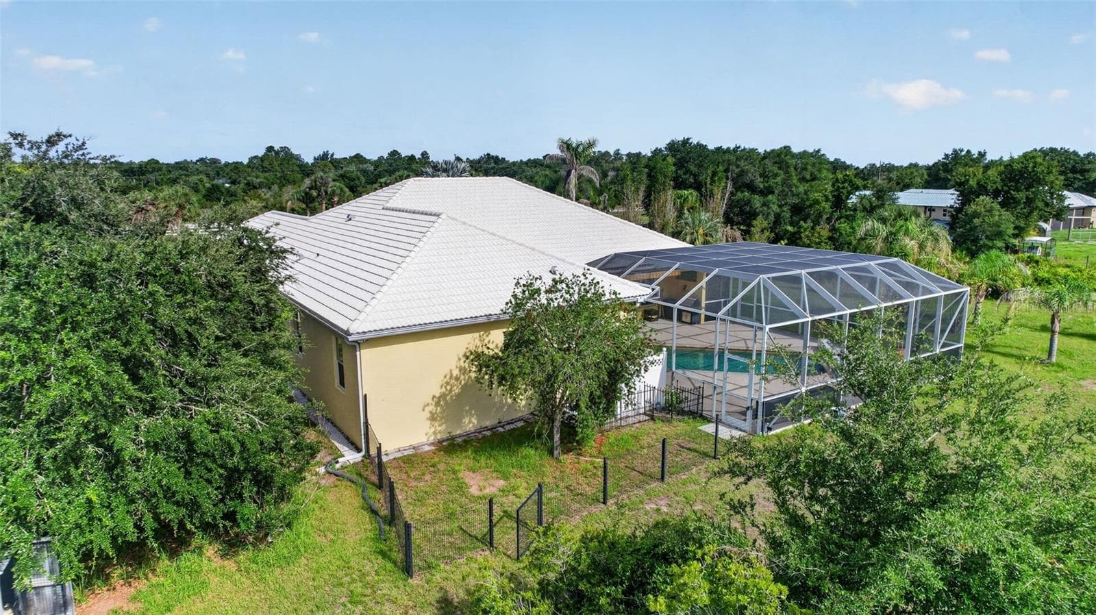 Surrounded by natural beauty and mature vegetation, the property offers a rare combination of privacy, space, and serene country living. - 1210 408TH CT E, MYAKKA CITY