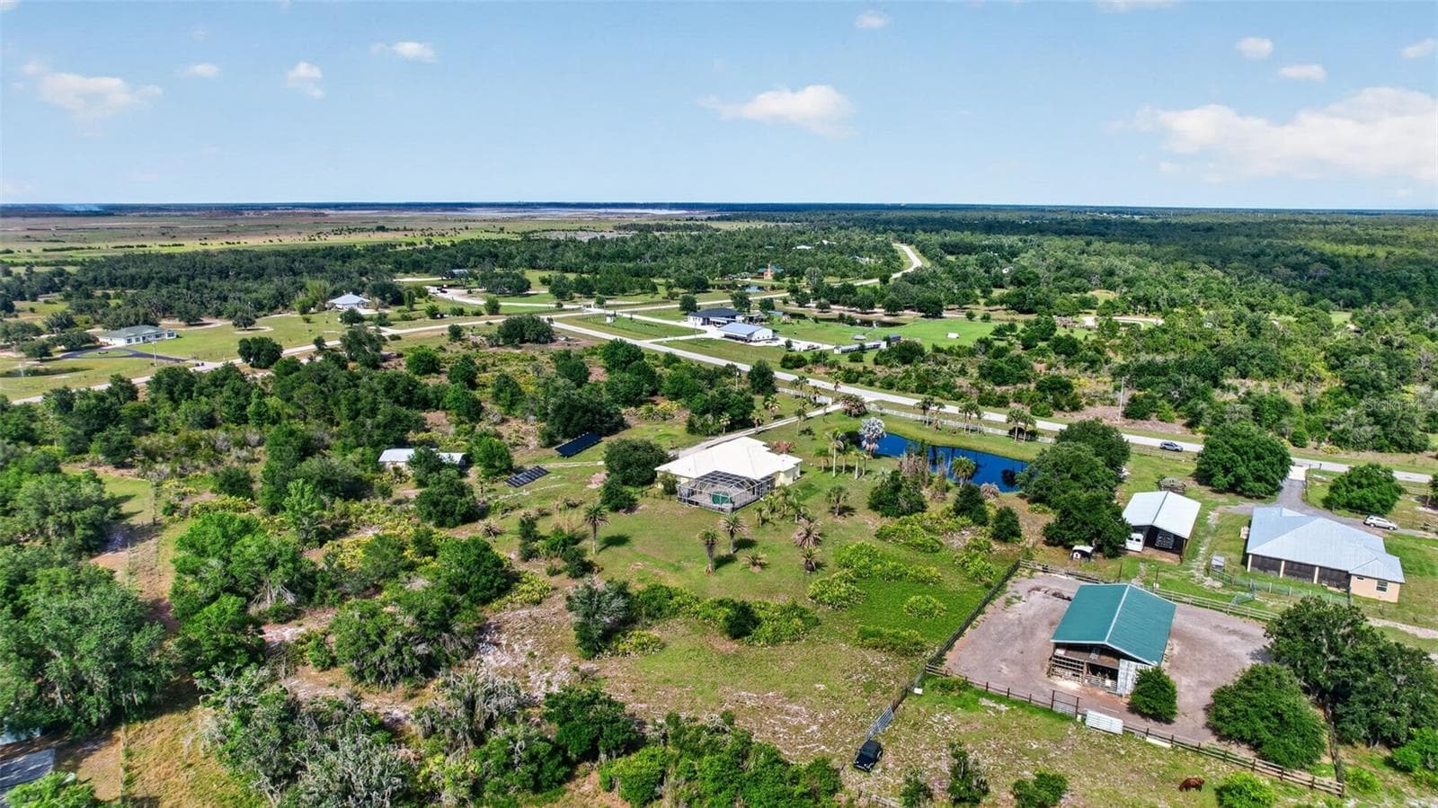 The property's impressive acreage provides room to roam, entertain, pursue hobbies, or simply enjoy the beauty of Florida country living. - 1210 408TH CT E, MYAKKA CITY