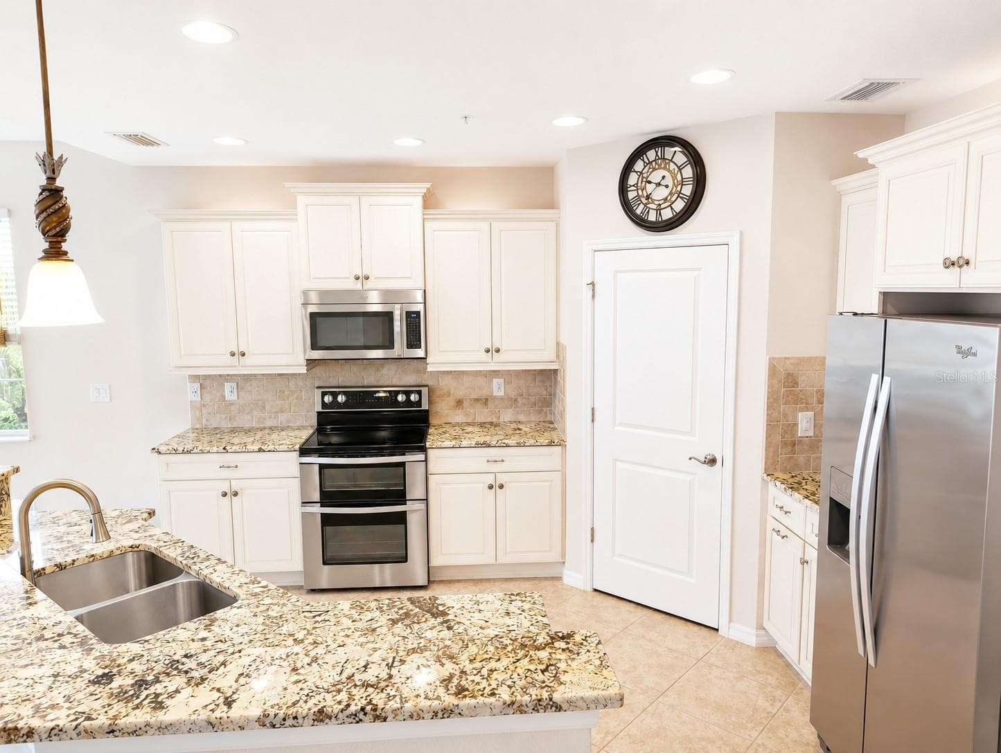 Kitchen with new double oven. - 1264 RIVERSCAPE ST #B, BRADENTON
