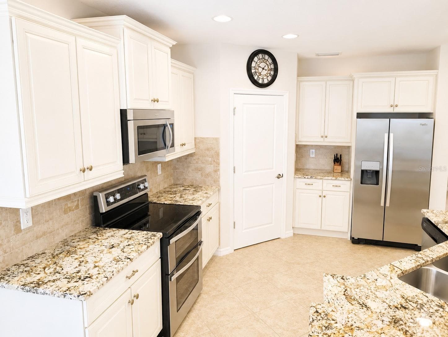 Kitchen with new double oven. - 1264 RIVERSCAPE ST #B, BRADENTON