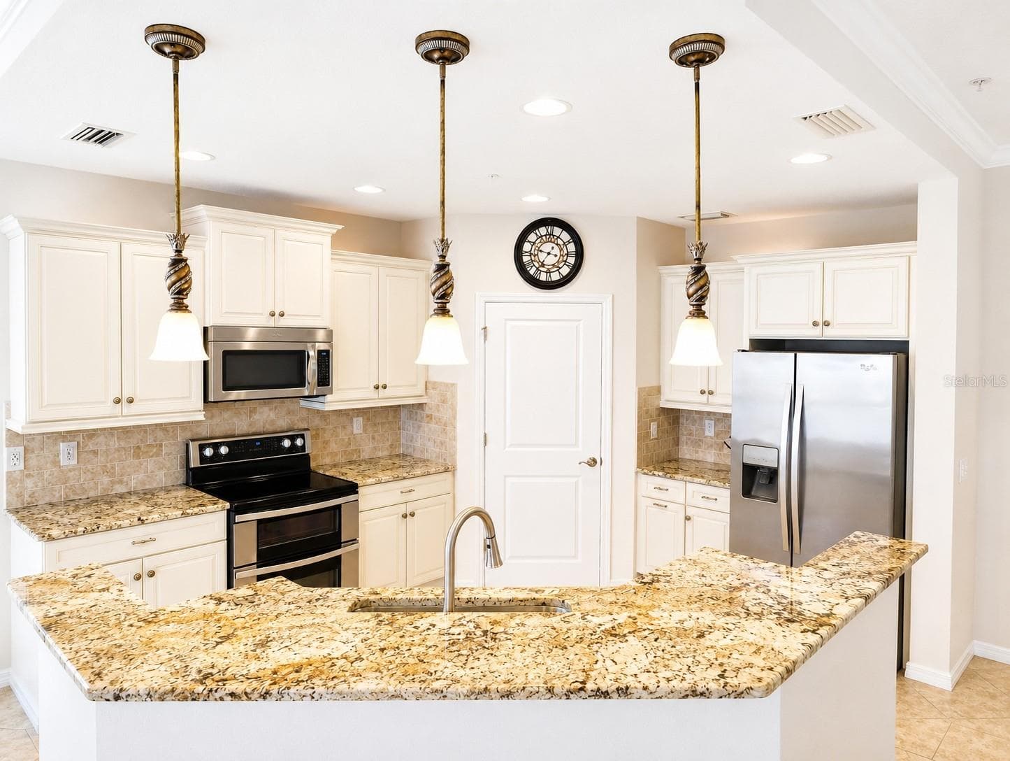Kitchen with new double oven. - 1264 RIVERSCAPE ST #B, BRADENTON