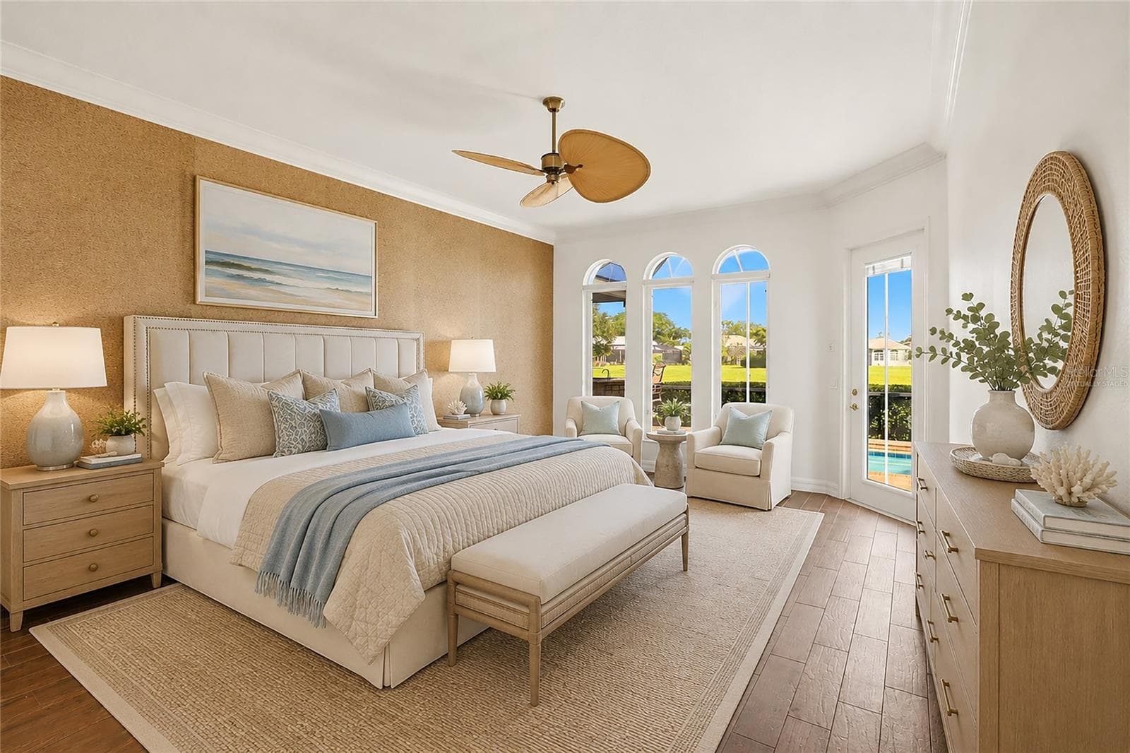 This photo is virtually staged. The first-floor primary suite features direct access to the lanai and showcases peaceful views of the lake and pool. - 8417 LONE EAGLE WAY, SARASOTA