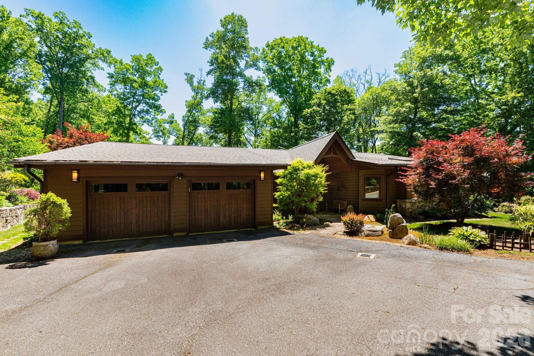 Architecturally striking mountain residence with a warm contemporary design, beautifully integrated into the natural surroundings. - 29 Gardner Drive, Asheville