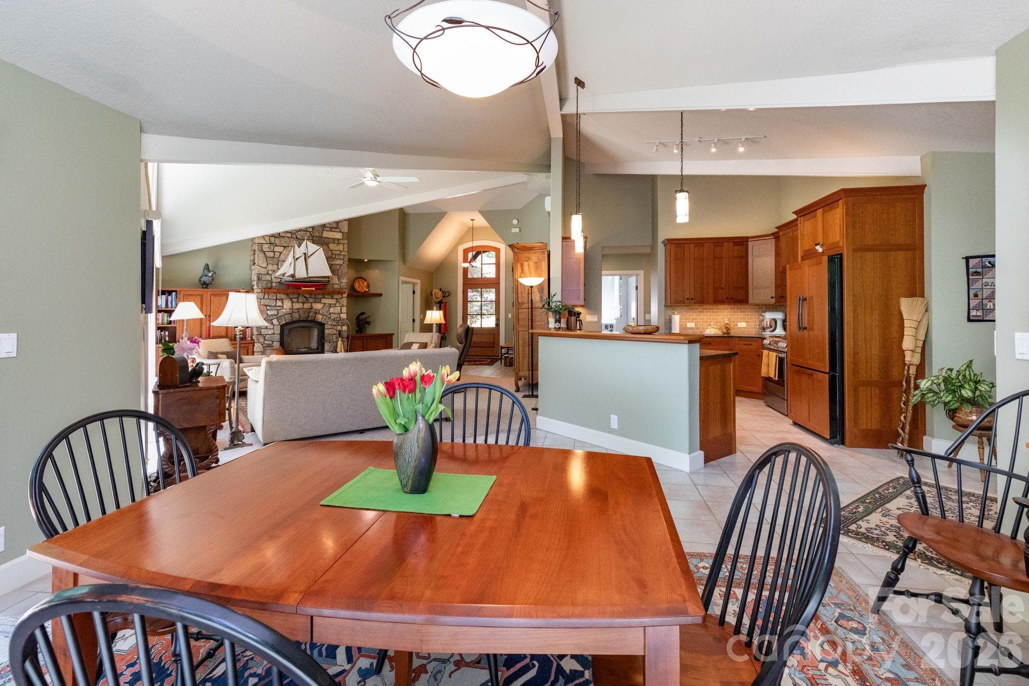 Thoughtfully designed open-concept living connects the dining area, great room, and kitchen, creating an effortless flow for entertaining and comfortable daily living. - 29 Gardner Drive, Asheville