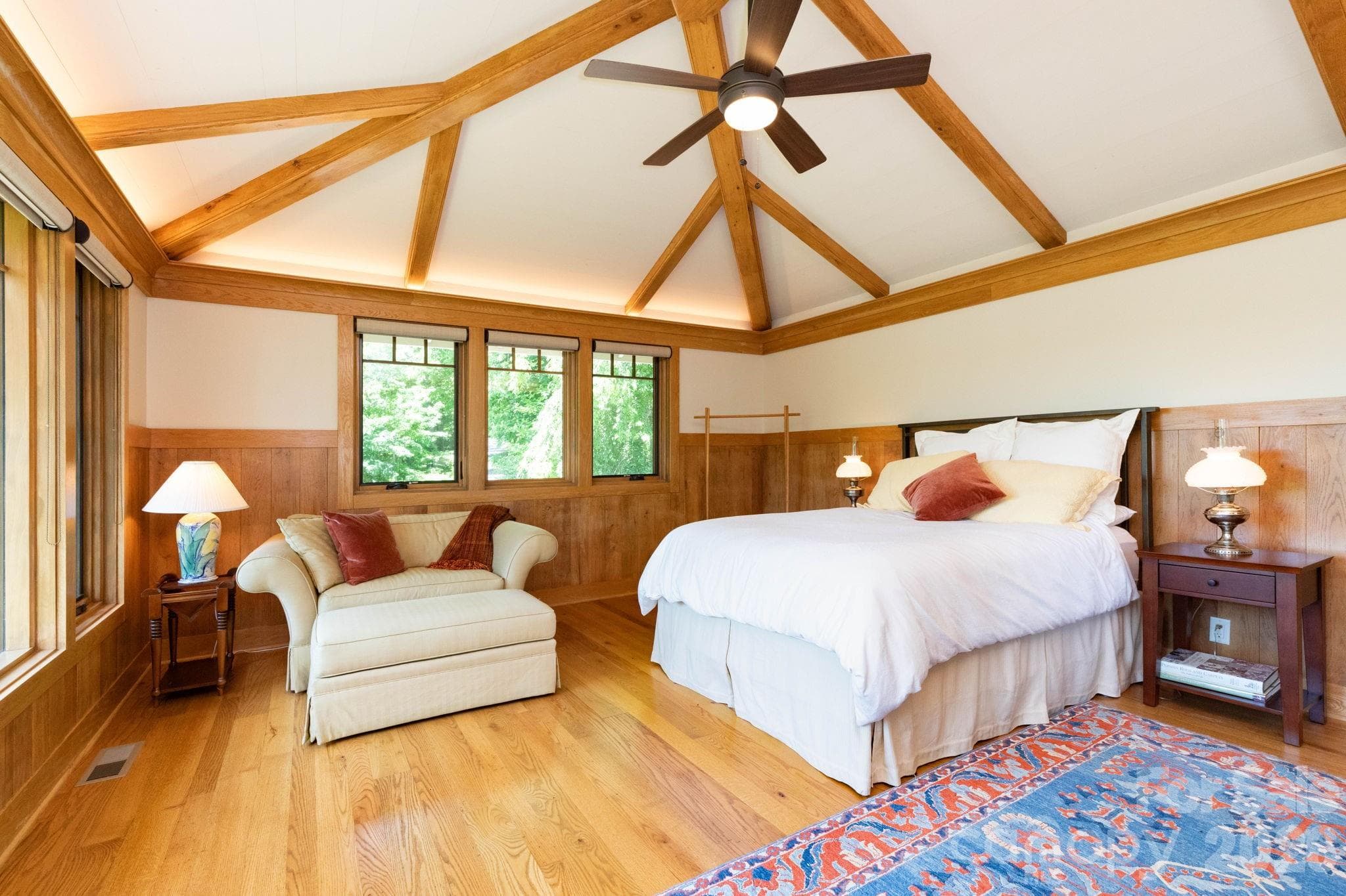 Guest House. Spacious primary bedroom designed for comfort and serenity, filled with natural light and warm custom wood detailing throughout. - 29 Gardner Drive, Asheville