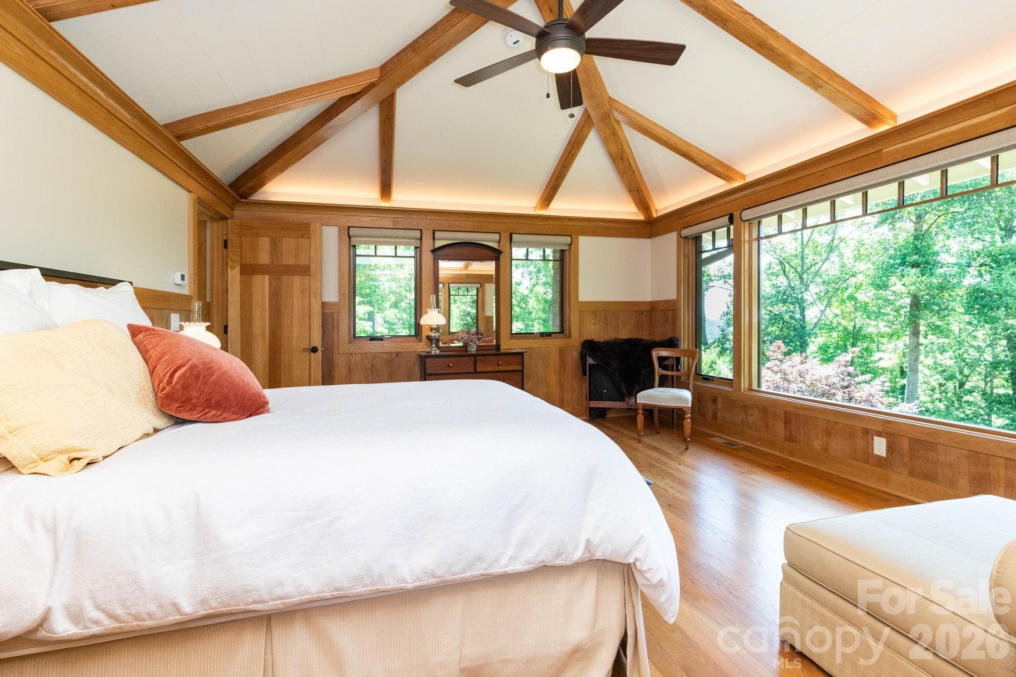 Guest House. Spacious primary bedroom designed for comfort and serenity, filled with natural light and warm custom wood detailing throughout. - 29 Gardner Drive, Asheville
