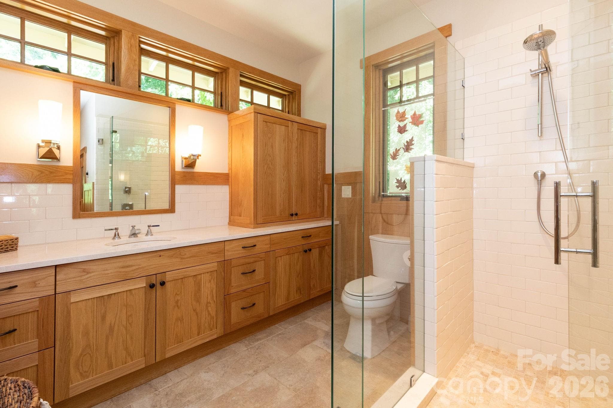 Guest House. Beautifully designed bath with custom wood cabinetry, quartz countertops, oversized walk-in tiled shower, and refined craftsmanship. - 29 Gardner Drive, Asheville