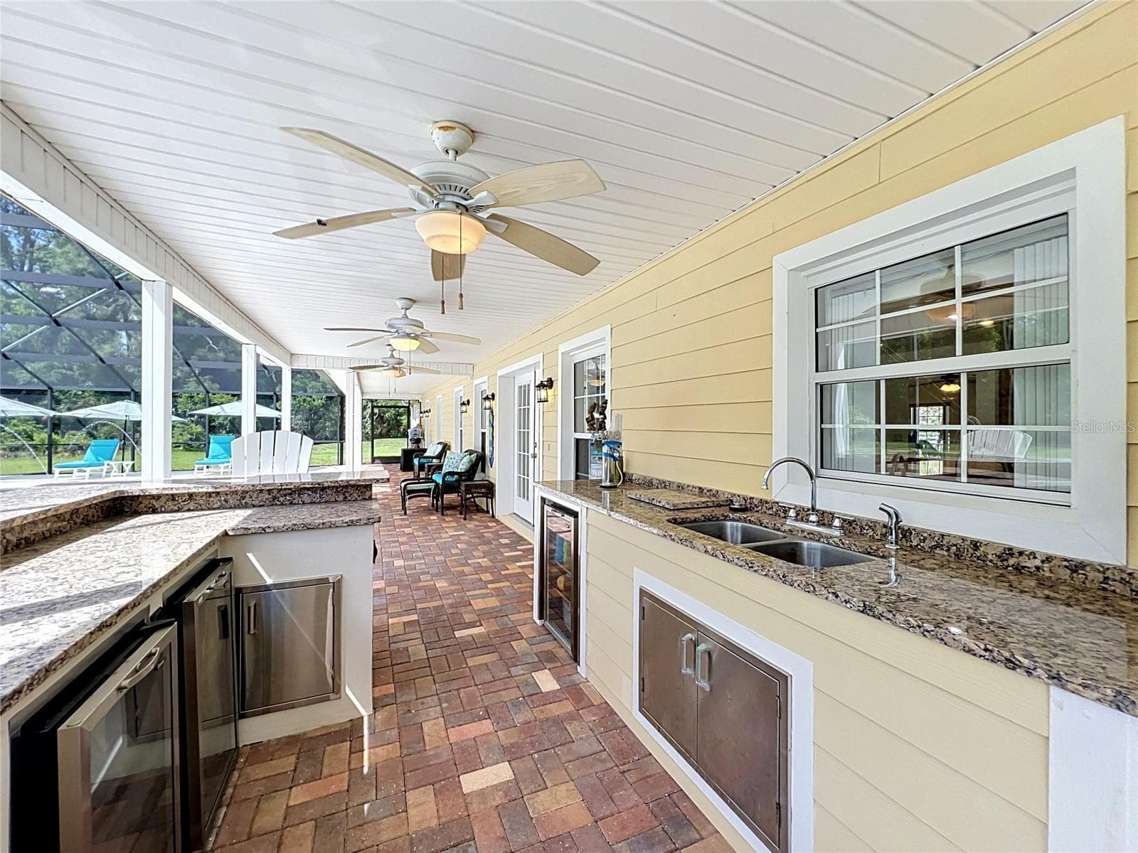 Covered patio all the way down! - 2300 PINE MEADOWS PL, CHULUOTA
