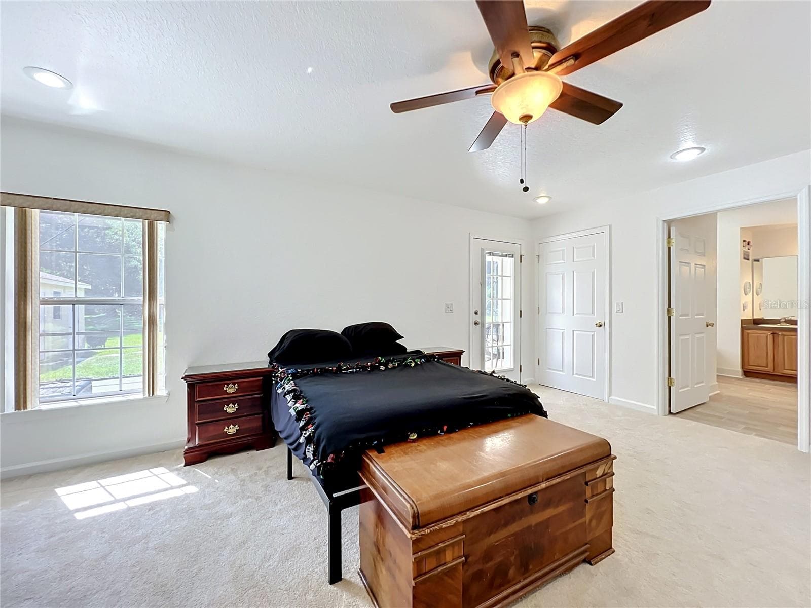 Larger Primary Suite-pool access-left wing - 2300 PINE MEADOWS PL, CHULUOTA