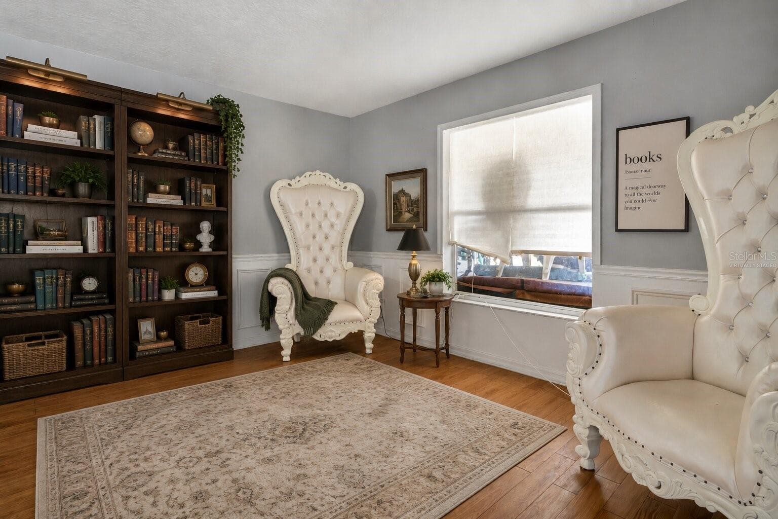 Family Room Virtually Staged as Library - 7642 PARK HILL AVE, LEESBURG