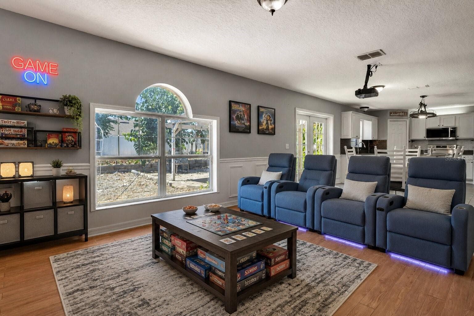 Media Room Virually Staged as Game Room - 7642 PARK HILL AVE, LEESBURG