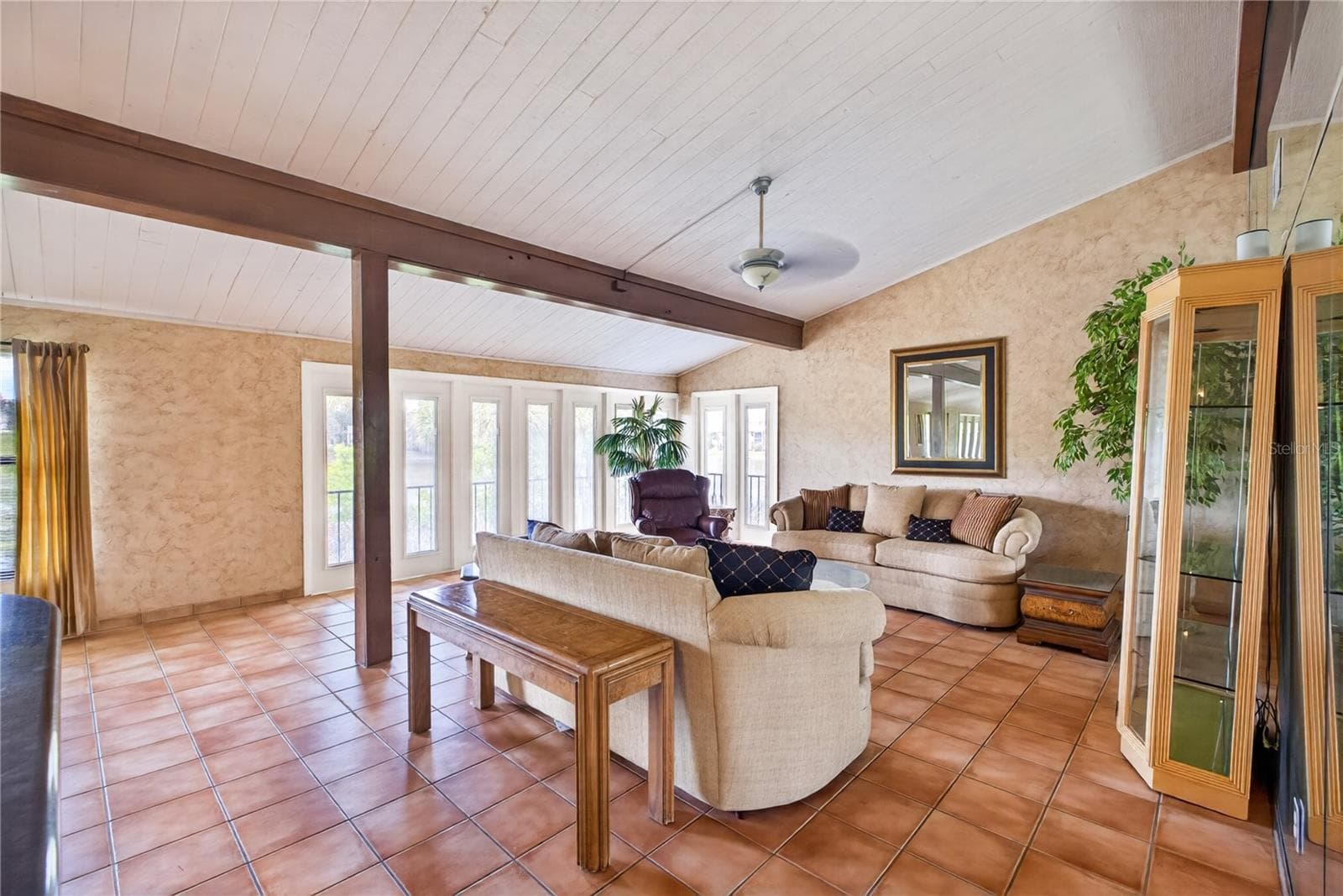 Expanded living room with views of Lake Orienta! - 200 MAITLAND AVE #128, ALTAMONTE SPRINGS