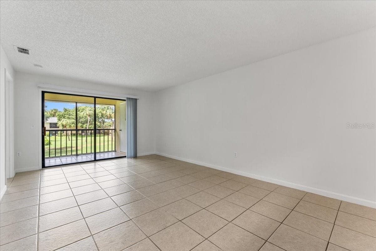 Living Room - 3001 58TH AVE S #1106, ST PETERSBURG