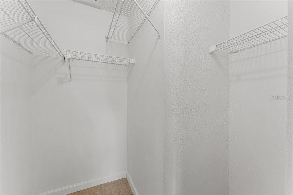Primary walk in closet - 3001 58TH AVE S #1106, ST PETERSBURG