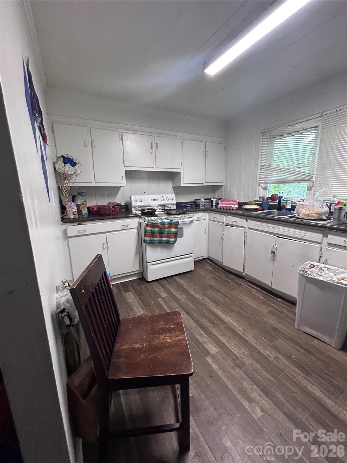 View from breakfast area looking into the kitchen. - Gastonia