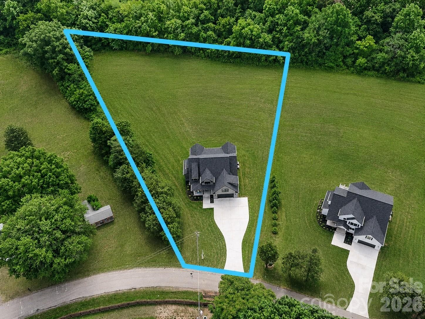 Concept Grass - Expansive tree-lined homesite offering exceptional privacy, a spacious backyard, and stunning aerial views in a peaceful countryside setting. Lot lines are approximate. - Statesville