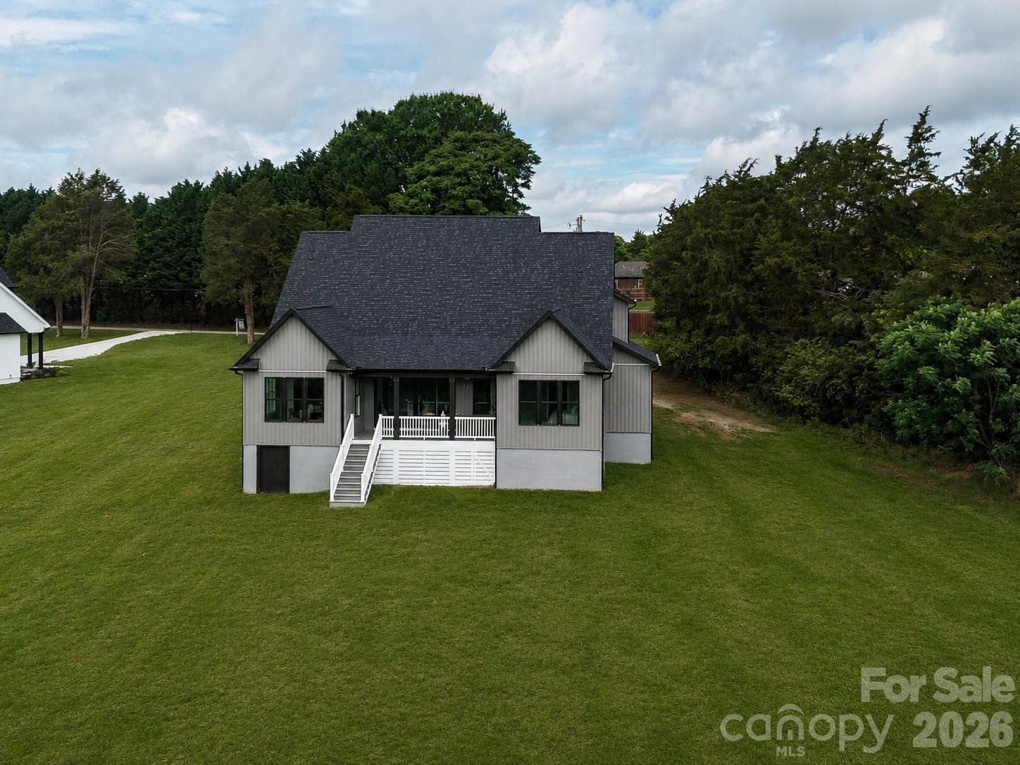 Concept Grass - Enjoy peaceful backyard living with a spacious covered porch, expansive green space, and private tree-lined views perfect for relaxing or entertaining. - Statesville