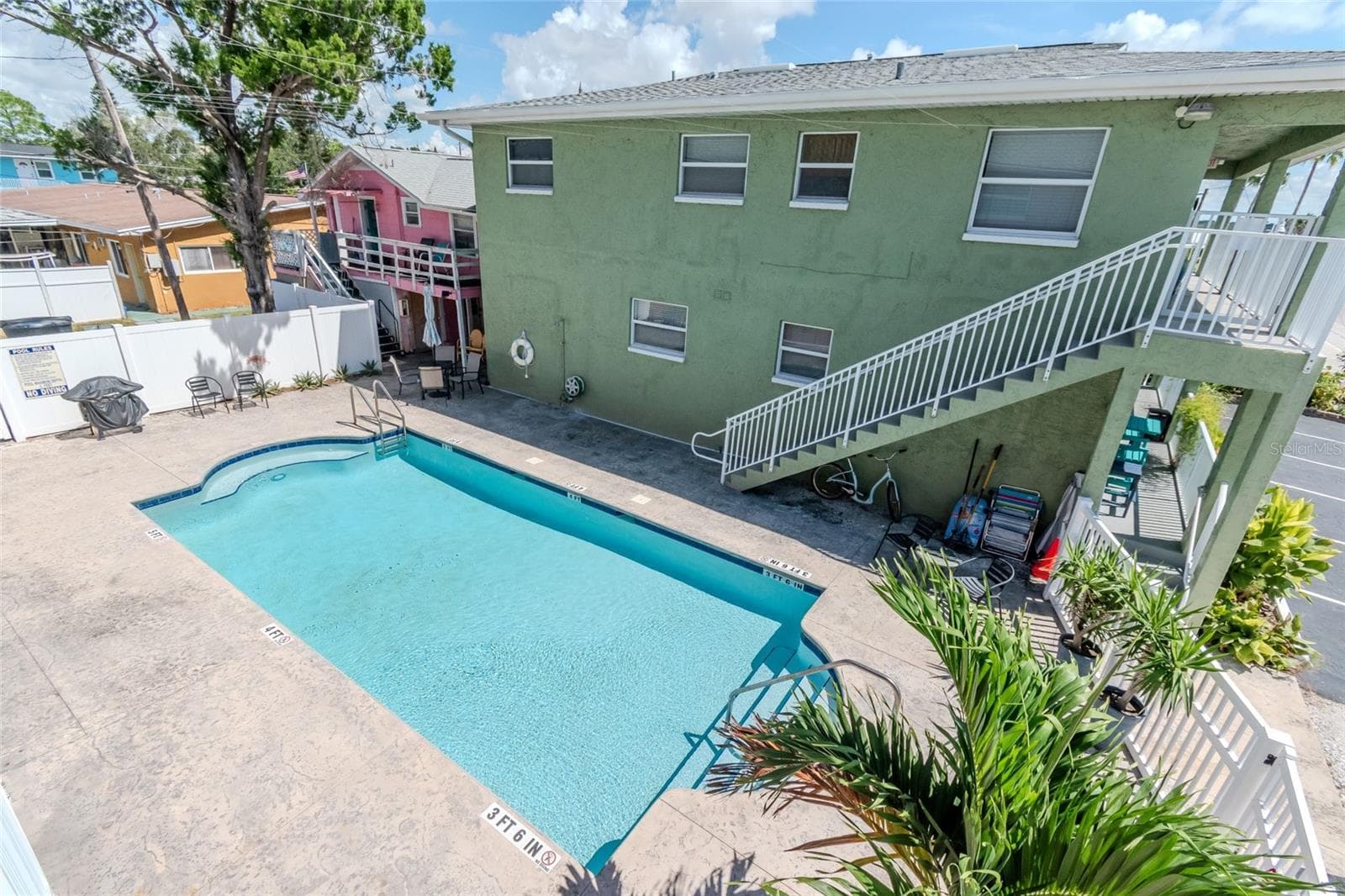 SECURE ENTRANCE TO POOL AREA OFF FROM THE BALCONY - 5605 SHORE BLVD S #1B, GULFPORT