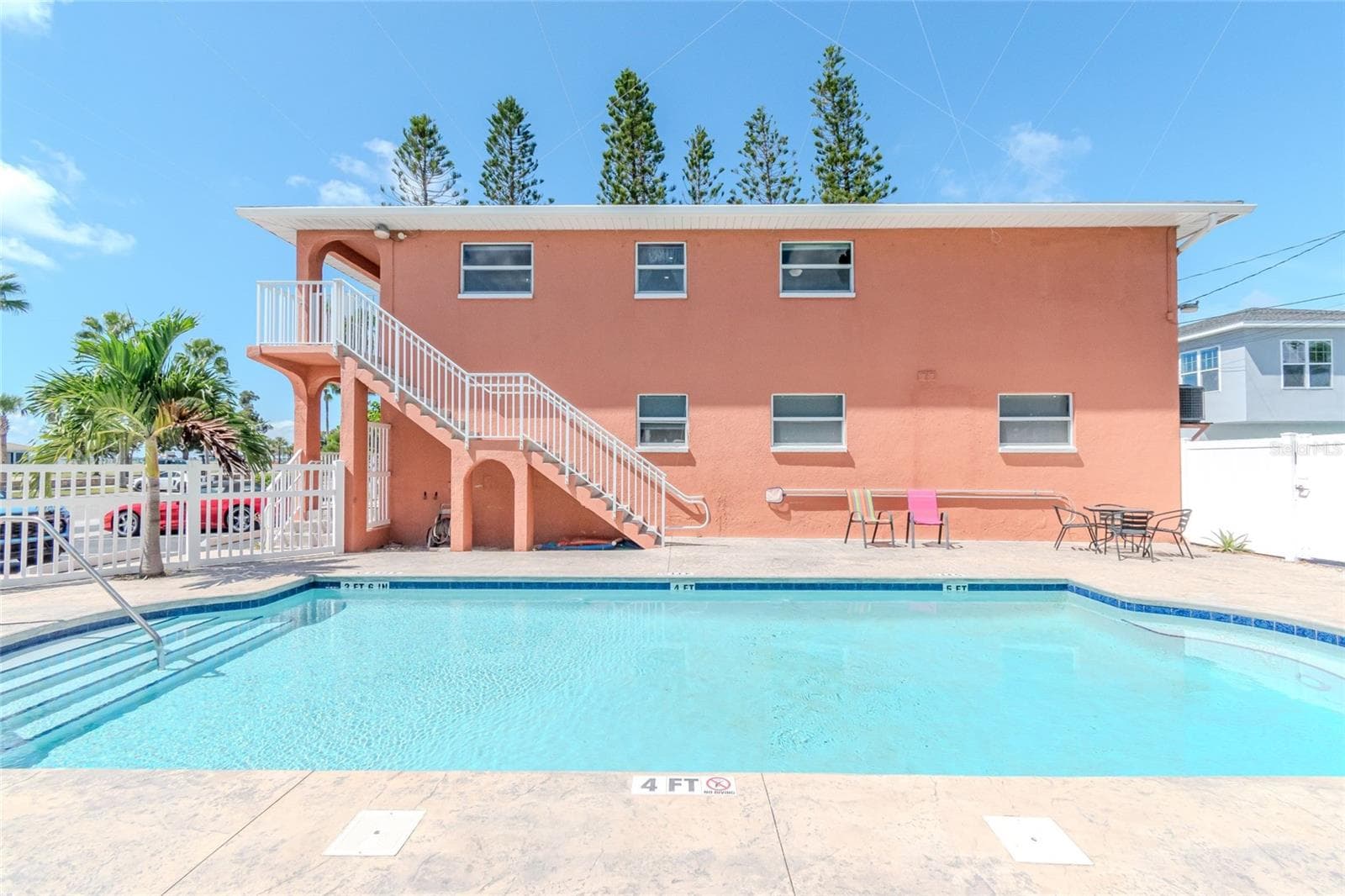 POOL AREA FACING THE 5605 BLDG. - 5605 SHORE BLVD S #1B, GULFPORT