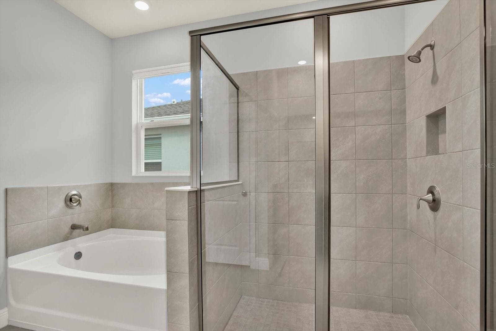 Primary bathroom - soaking tup and stand alone shower - 32332 ROSEPINE BLVD, WESLEY CHAPEL
