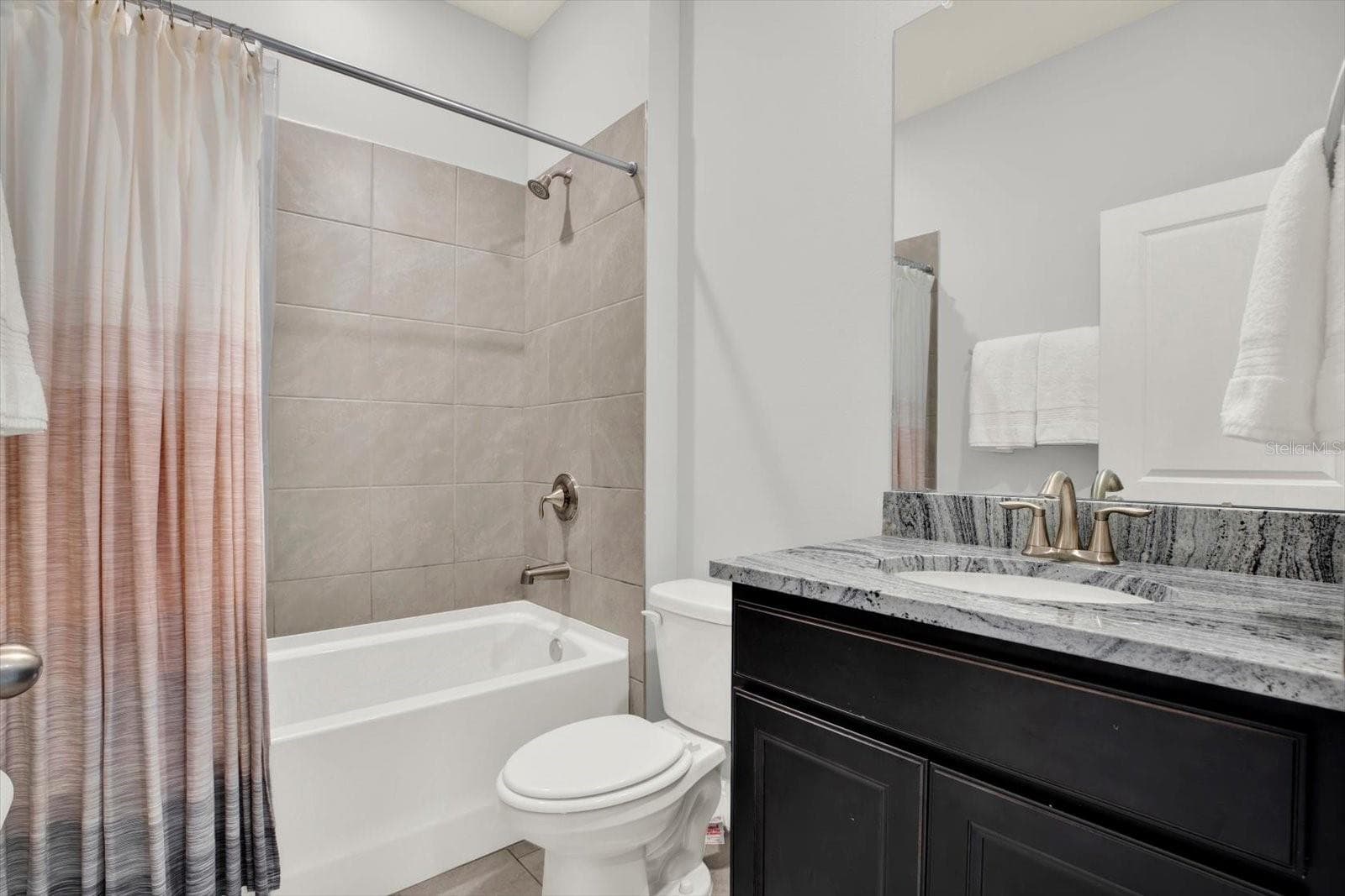 Bath 2 features tub/shower combo and granite counter - 32332 ROSEPINE BLVD, WESLEY CHAPEL