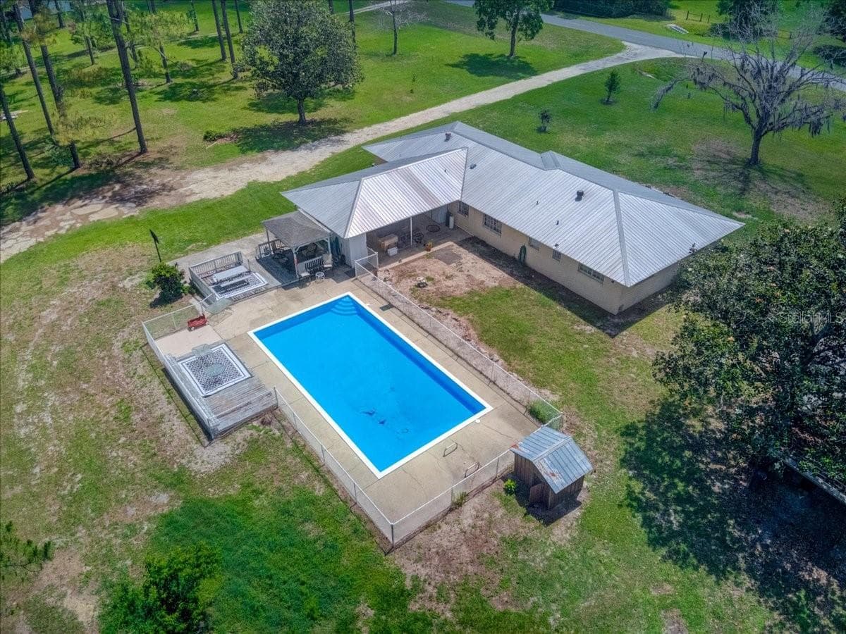 Single Family Residence at 7422 S COUNTY ROAD 231, LAKE BUTLER, photo 49 of 57