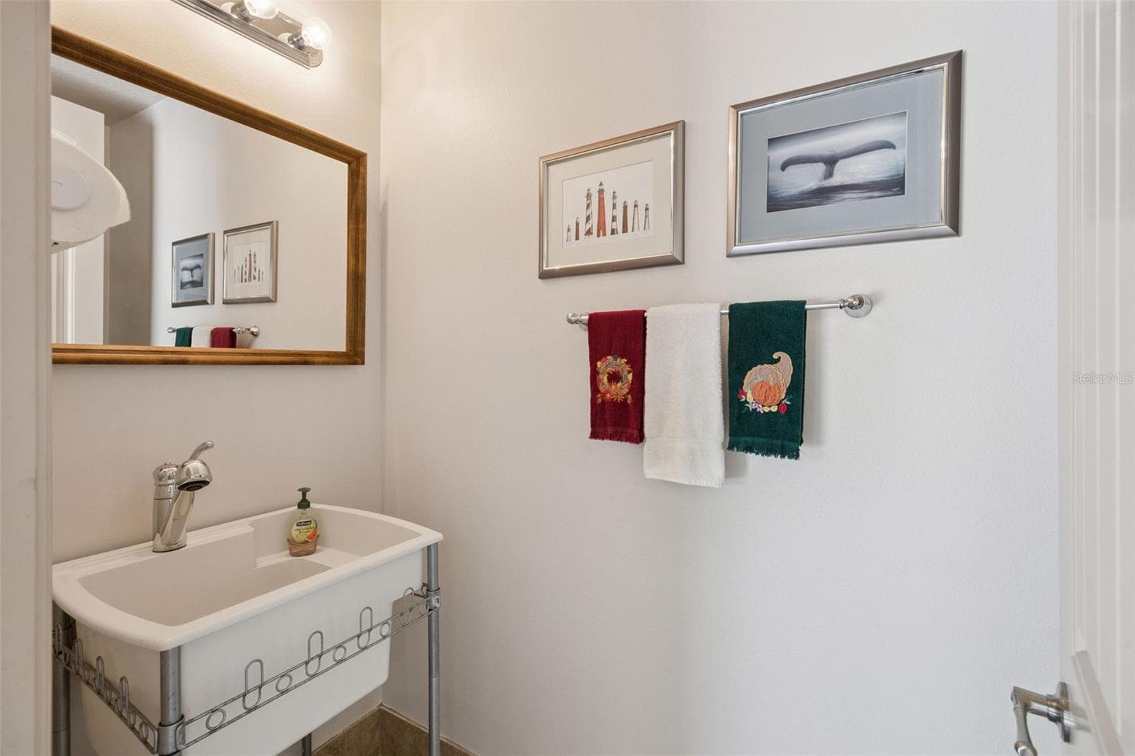 Half bath inside 4 car garage - 2075 MUSTANG CT, ST CLOUD