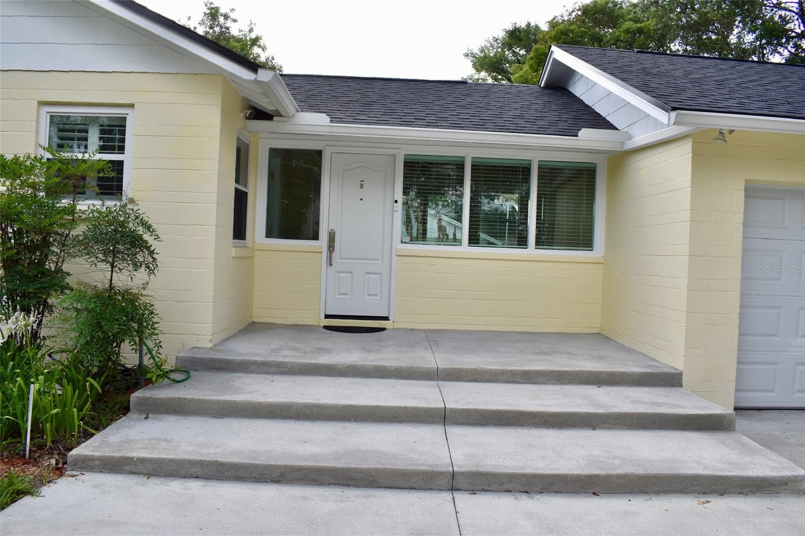 Side patio. - 2200 E GORE ST, ORLANDO